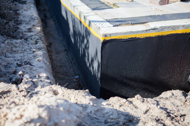 Professional Exterior Waterproofing technician working in Westbury, NY